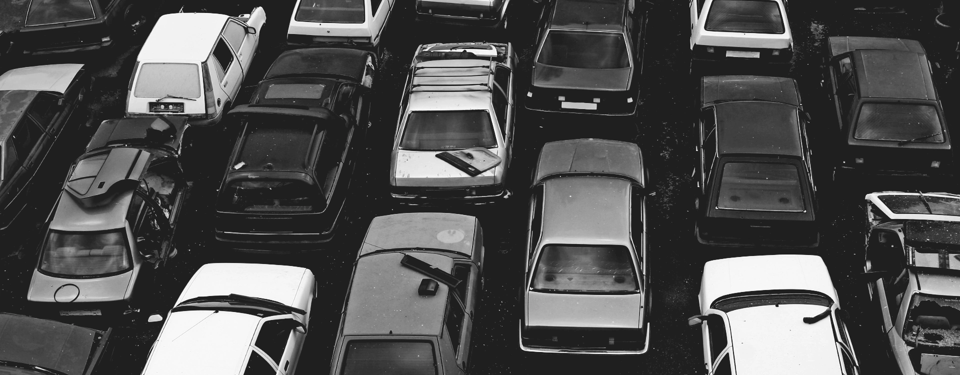 an aerial view of the collected junk cars